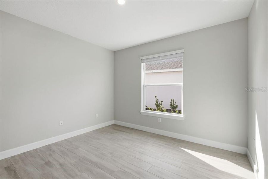 Spacious, unfurnished interior of a new home in Esplanade at Westview, Kissimmee (Image 16).