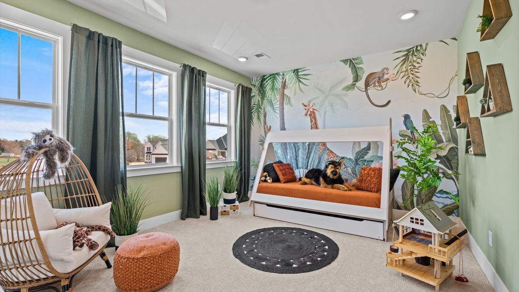 Refined bedroom design with large windows for daylight-filled mornings and peaceful views