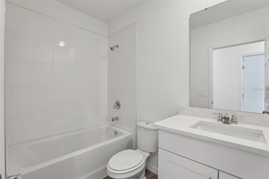 Furnished interior view inside a new home in Lawson Dunes - Signature Series, Haines City (Image 9).