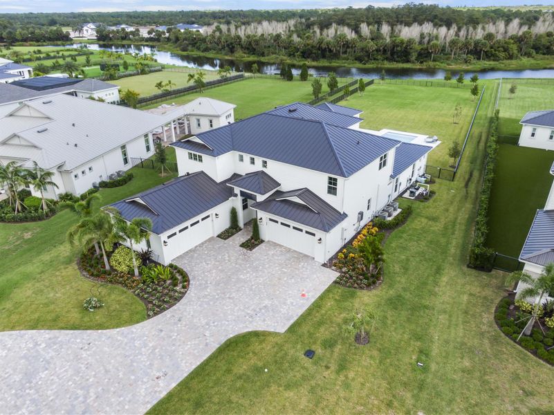 Front exterior of a new home in , Jupiter, FL, highlighting curb appeal (Image 1).