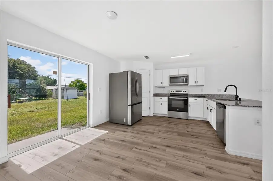 Furnished interior view inside a new home in , Port Charlotte (Image 8).