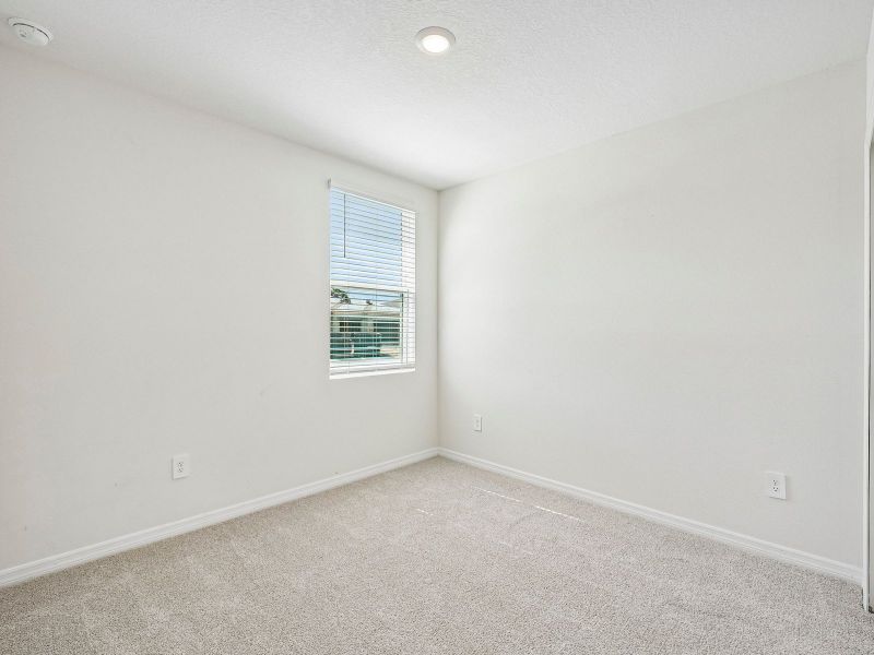Spacious, unfurnished interior of a new home in The Reserve at Van Oaks, Auburndale (Image 14).