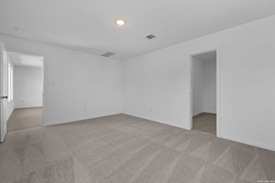 Spacious, unfurnished interior of a new home in Voss Farms: Watermill Collection, New Braunfels (Image 19).