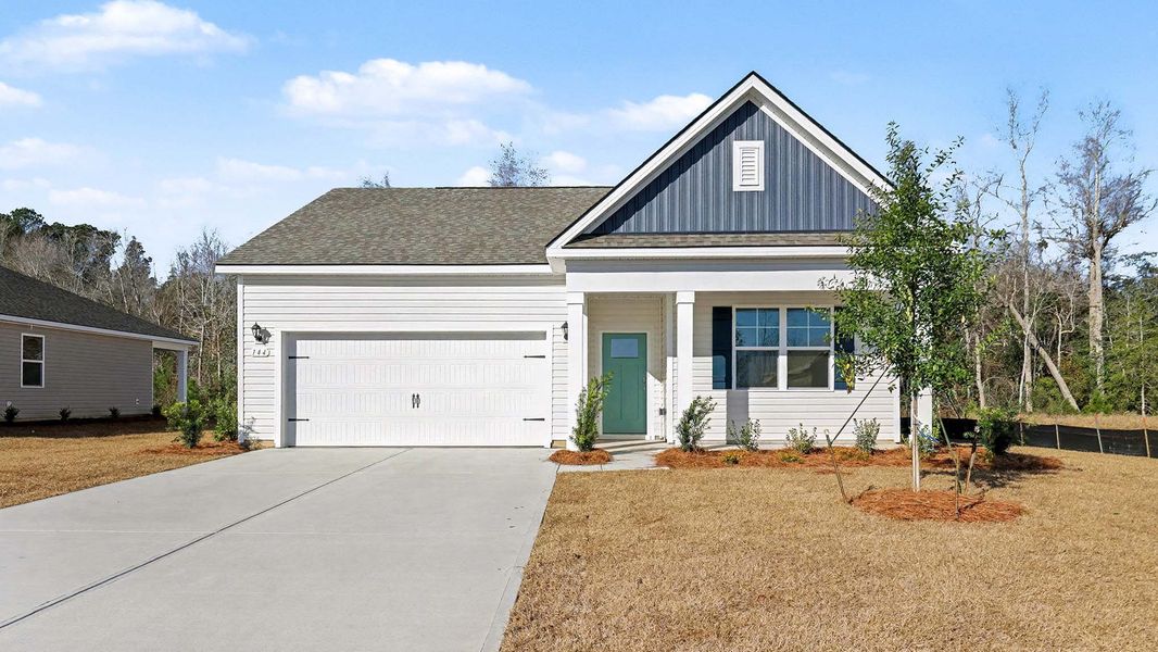 Front exterior of a new home in Pinewood Estates, Conway, SC, highlighting curb appeal (Image 1). Front exterior of a new home in Pinewood Estates, Conway, SC, highlighting curb appeal (Image 1).