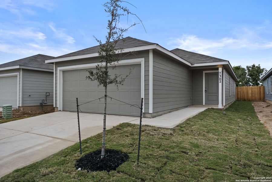 Front exterior of a new home in Torian Village: Belmar Collection, San Antonio, TX, highlighting curb appeal (Image 1).