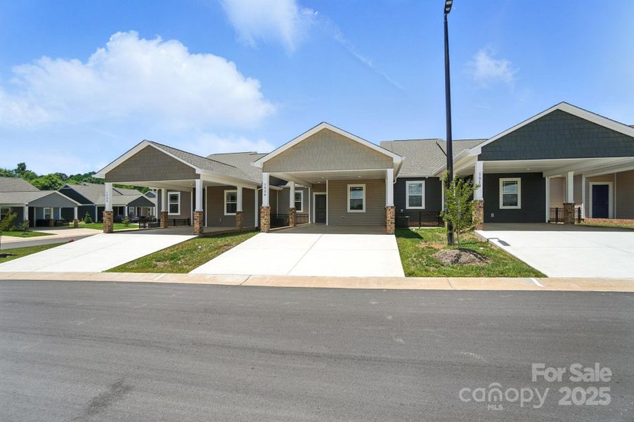 Front exterior of a new home in , Hickory, NC, highlighting curb appeal (Image 28).