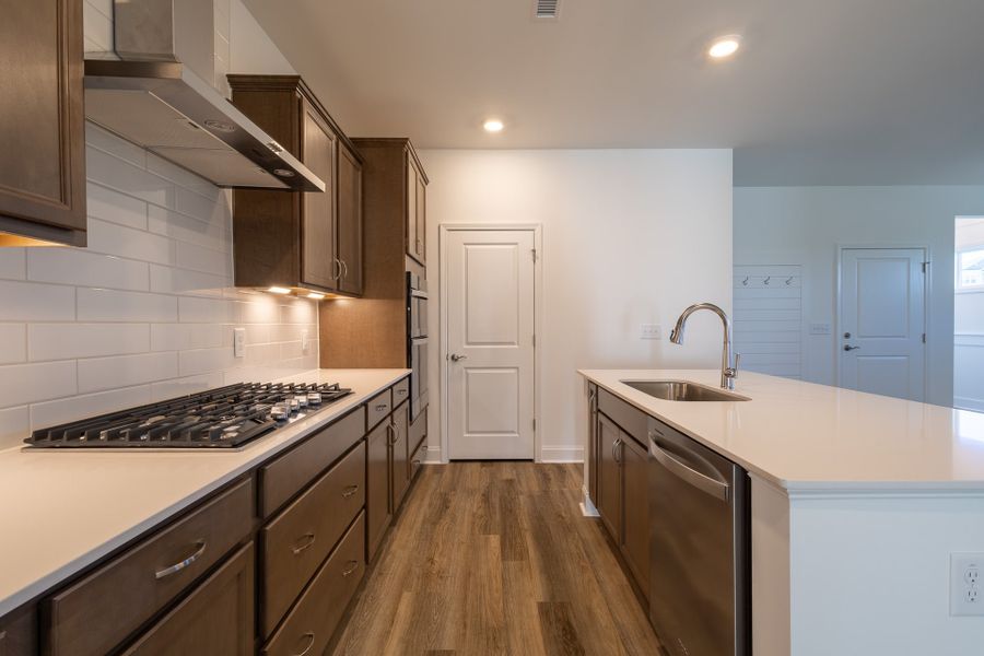 Representative furnished interior of a home built from the Camellia by McKee Homes in The Walk at East Village, Clayton (Image 4). Representative furnished interior of a home built from the Camellia by McKee Homes in The Walk at East Village, Clayton (Image 4).