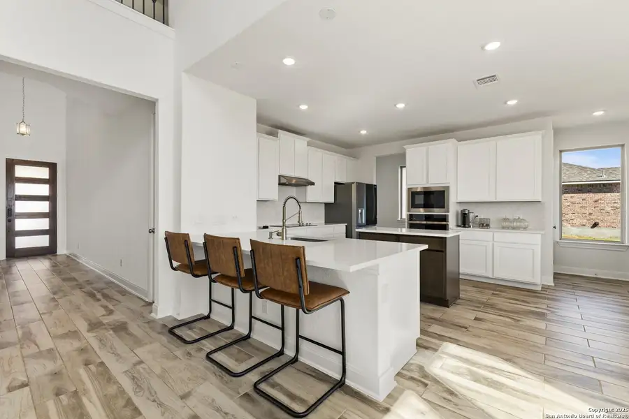Furnished interior view inside a new home in Arched Oaks, Floresville (Image 9). Furnished interior view inside a new home in Arched Oaks, Floresville (Image 9).