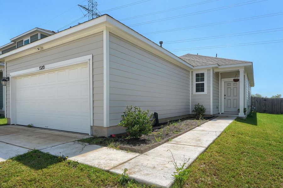 Exterior details and patio area of a home in Stallion Run, Buda (Image 21).