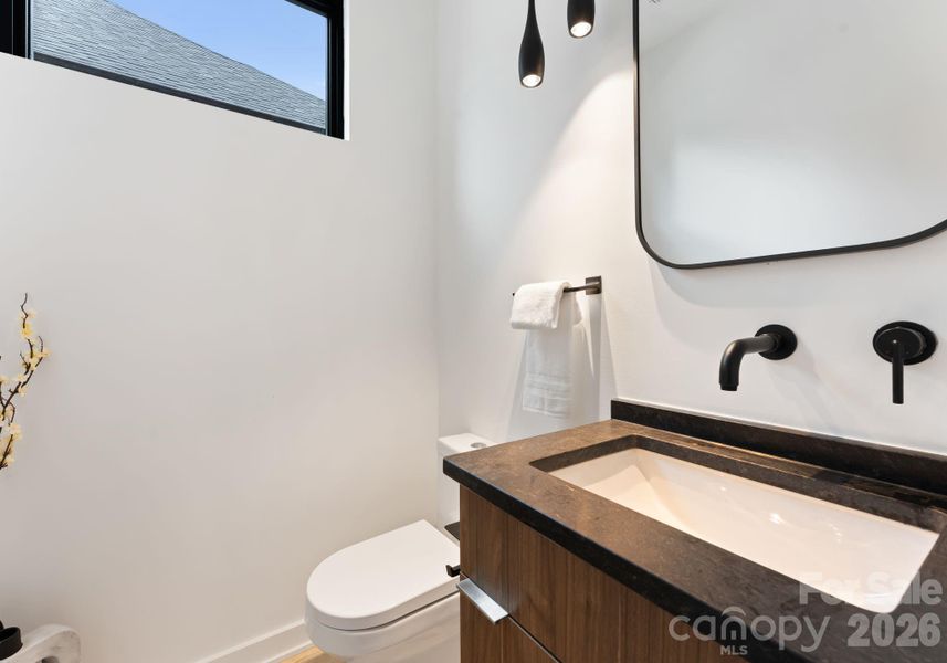 Main level half bathroom.