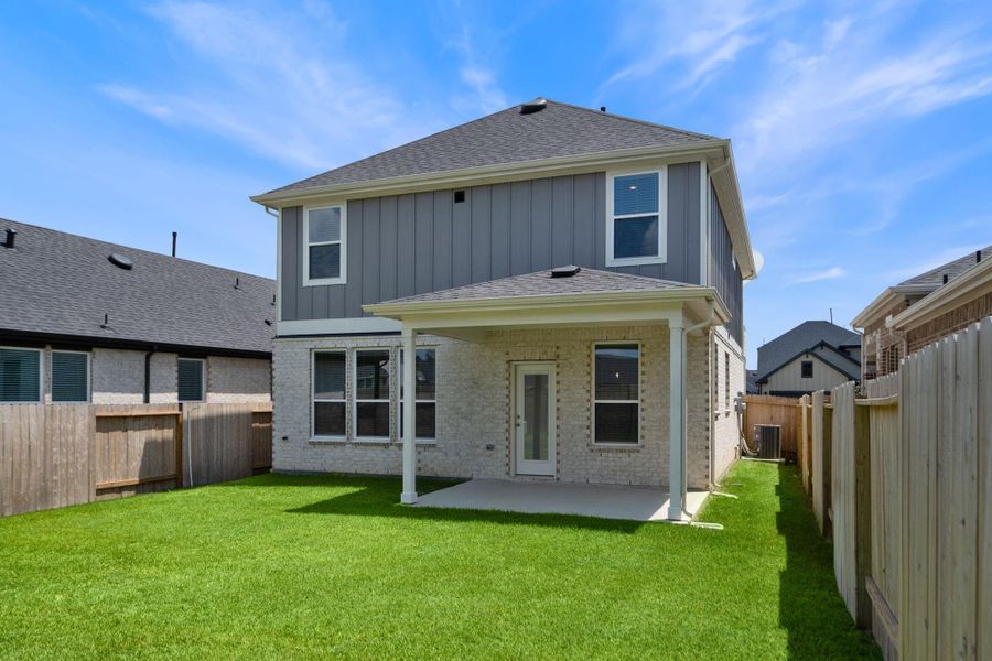 Front exterior of a new home in Ellerden, Tomball, TX, highlighting curb appeal (Image 1). Front exterior of a new home in Ellerden, Tomball, TX, highlighting curb appeal (Image 1).