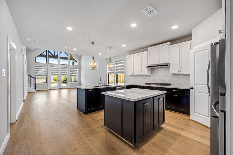 Gourmet kitchen with modern finishes and ample storage