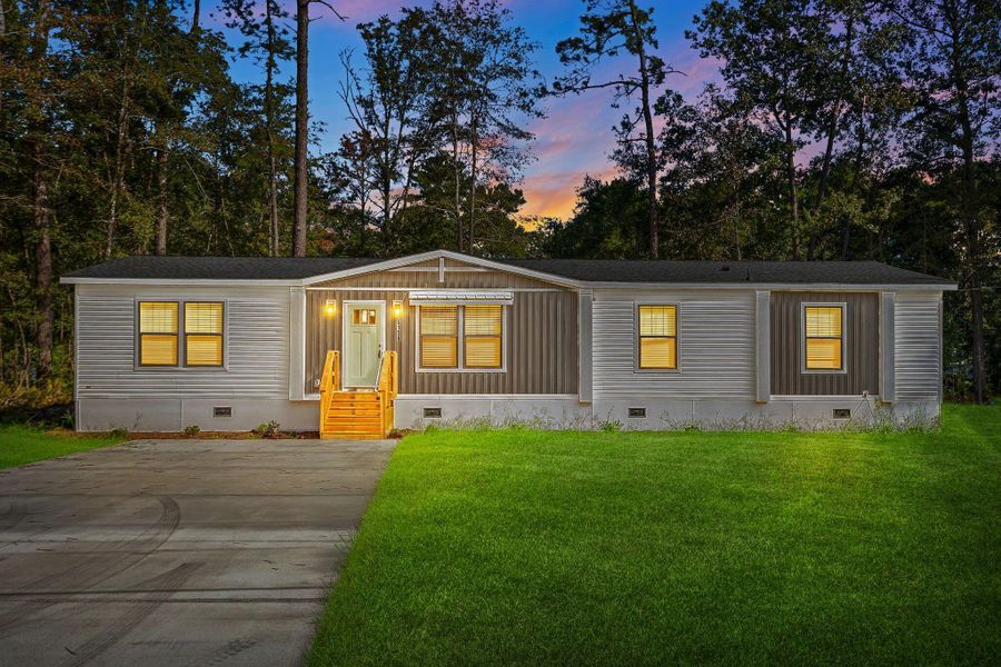 Exterior details and patio area of a home in , Ravenel (Image 26). Exterior details and patio area of a home in , Ravenel (Image 26).
