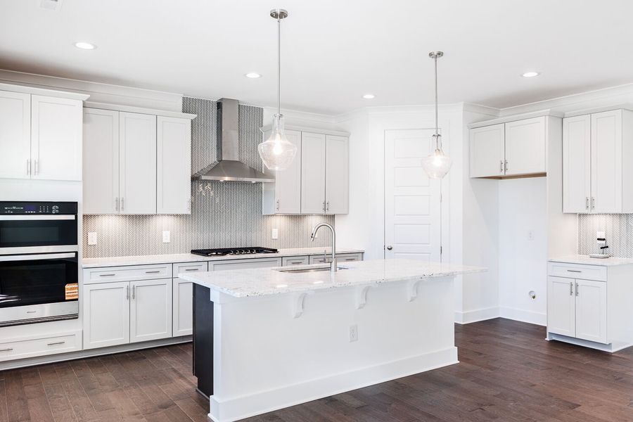 Furnished interior view inside a new home in High Grove Oaks, Fuquay Varina (Image 4). Furnished interior view inside a new home in High Grove Oaks, Fuquay Varina (Image 4).