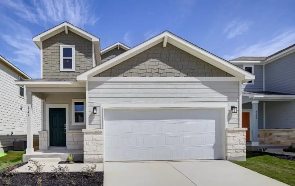 Front exterior of a new home in Spring Creek, San Antonio, TX, highlighting curb appeal (Image 1). Front exterior of a new home in Spring Creek, San Antonio, TX, highlighting curb appeal (Image 1).