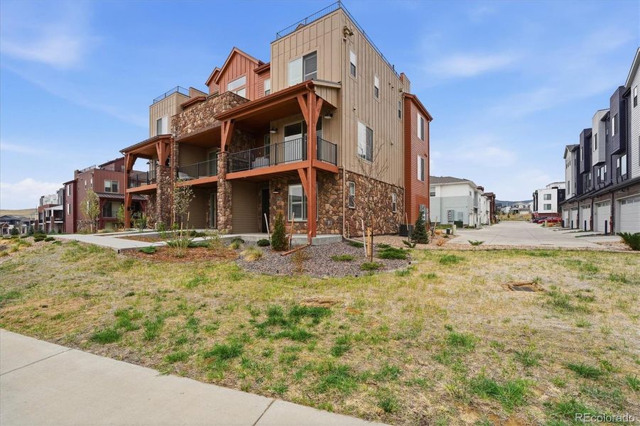 Front exterior of a new home in , Littleton, CO, highlighting curb appeal (Image 20).