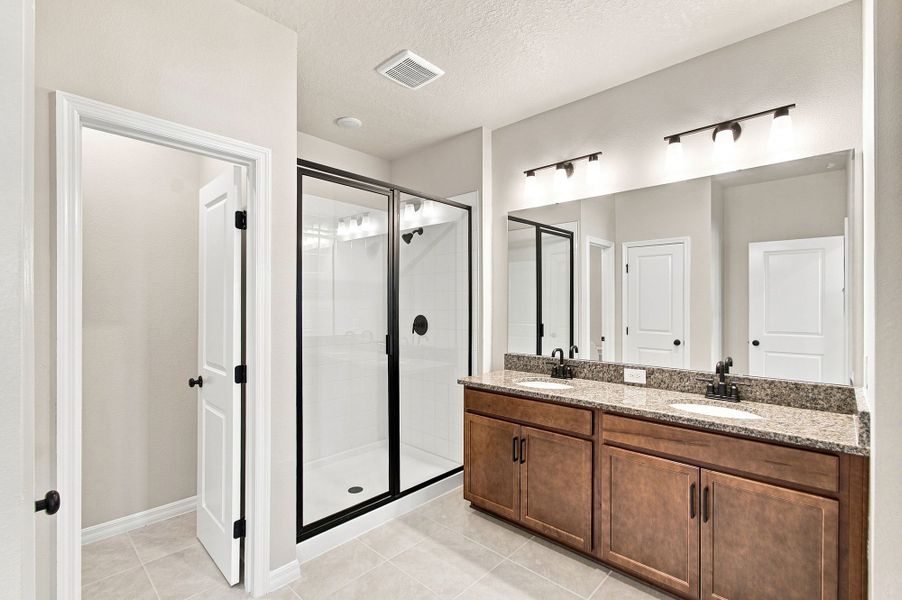 Representative furnished interior of a home built from the The Mcquade by David Weekley Homes in Palmeras at Crossprairie – The Palms Collection, St. Cloud (Image 5).