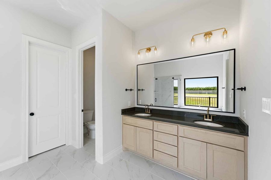 Furnished interior view inside a new home in Bridgeland 50′, Cypress (Image 10).