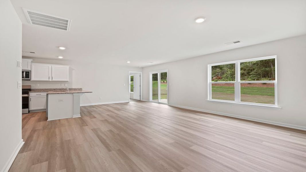 Spacious, unfurnished interior of a new home in Bentley Park, Greenwood (Image 20).