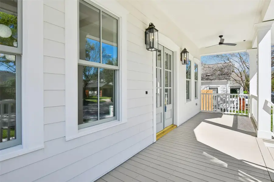 The front porch spans the entire width of the home and is a generous 8' deep, making the most of Norhill's unique but specific building line requirements. The front porch spans the entire width of the home and is a generous 8' deep, making the most of Norhill's unique but specific building line requirements.