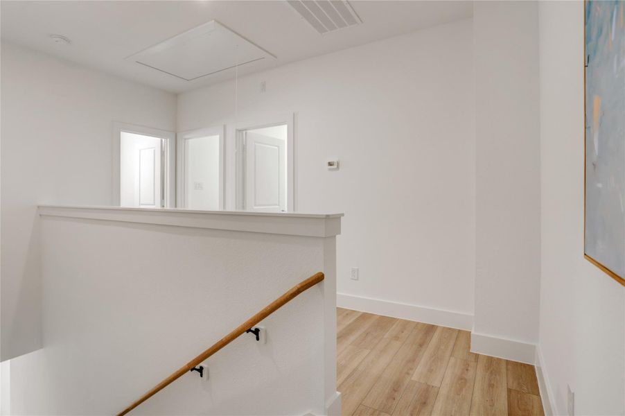 Stone Polymer Composite flooring across the house is scratch and water resistant and pet friendly.