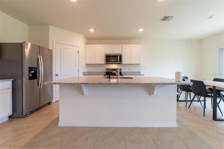 Furnished interior view inside a new home in , Harmony (Image 37).