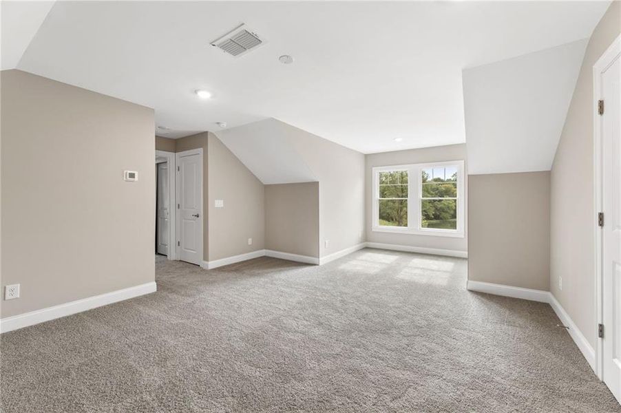 Spacious, unfurnished interior of a new home in The Courtyards at Bailey Farms, Dacula (Image 32).