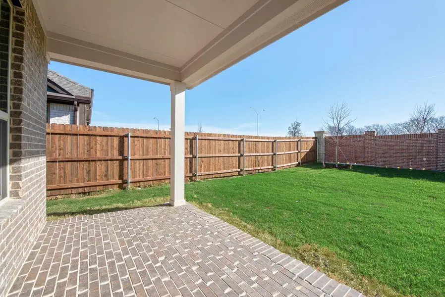 Exterior details and patio area of a home in Wildflower Ranch, Justin (Image 3). Exterior details and patio area of a home in Wildflower Ranch, Justin (Image 3).