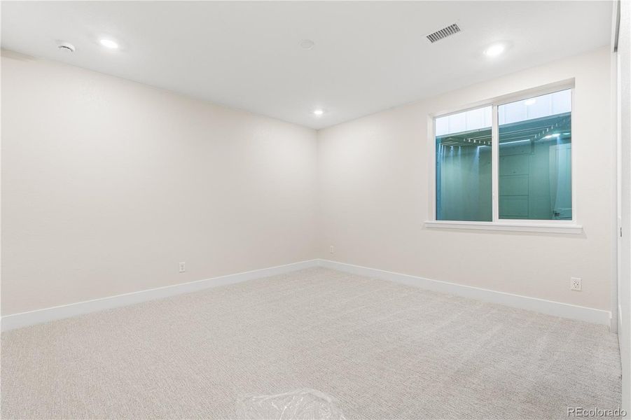 Spacious, unfurnished interior of a new home in Luxe at The Canyons, Castle Pines (Image 45).