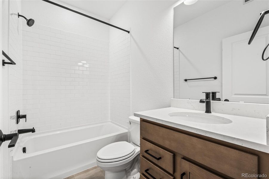 Furnished interior view inside a new home in Harvest Crossing, Aurora (Image 8).