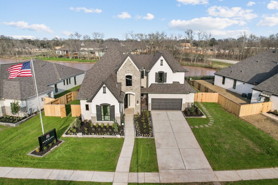 Front exterior of a new home in Fulbrook on Fulshear Creek 60', Fulshear, TX, highlighting curb appeal (Image 22).