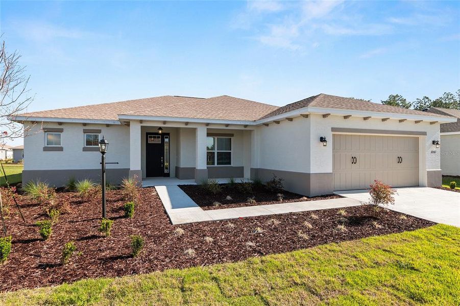 Front exterior of a new home in , Ocala, FL, highlighting curb appeal (Image 25).