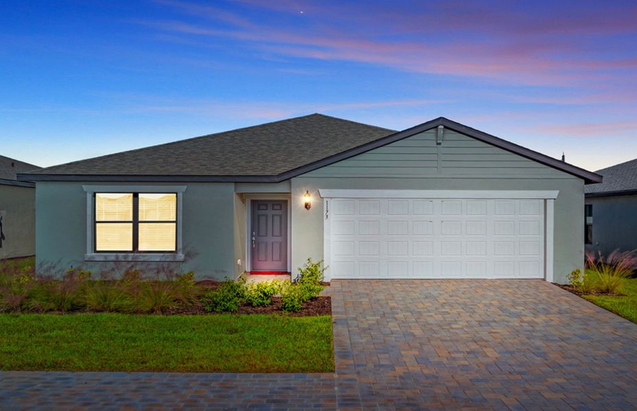 Front exterior of a new home in Caloosa Cove, Labelle, FL, highlighting curb appeal (Image 23).