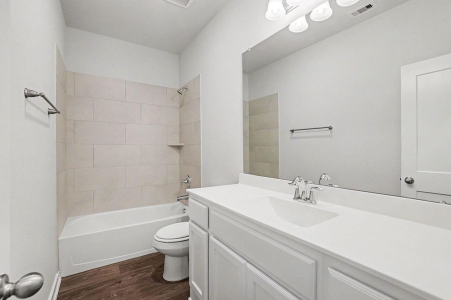 Furnished interior view inside a new home in Clear View Estates, Willis (Image 9).
