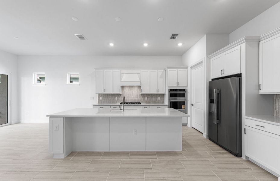 Furnished interior view inside a new home in BeachWalk by Manasota Key, Englewood (Image 10).