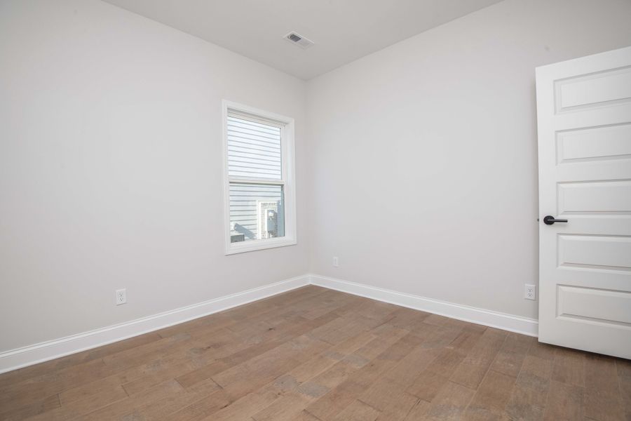 Spacious, unfurnished interior of a new home in Ivey Farms - The Grove Collection, Farragut (Image 29). Spacious, unfurnished interior of a new home in Ivey Farms - The Grove Collection, Farragut (Image 29).