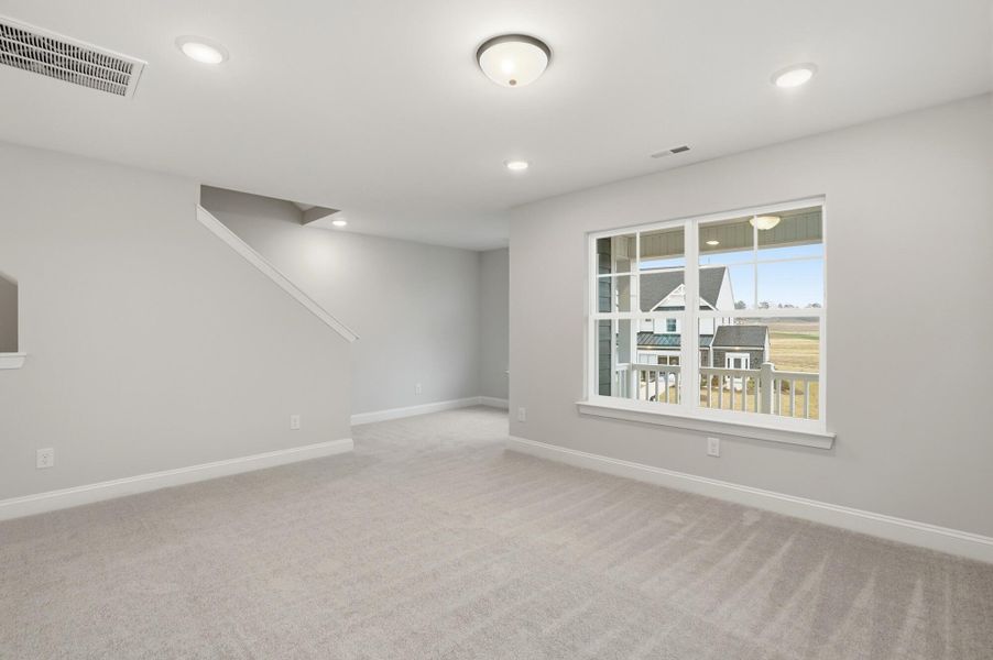 Spacious, unfurnished interior of a new home in Carrington, Stanley (Image 60).