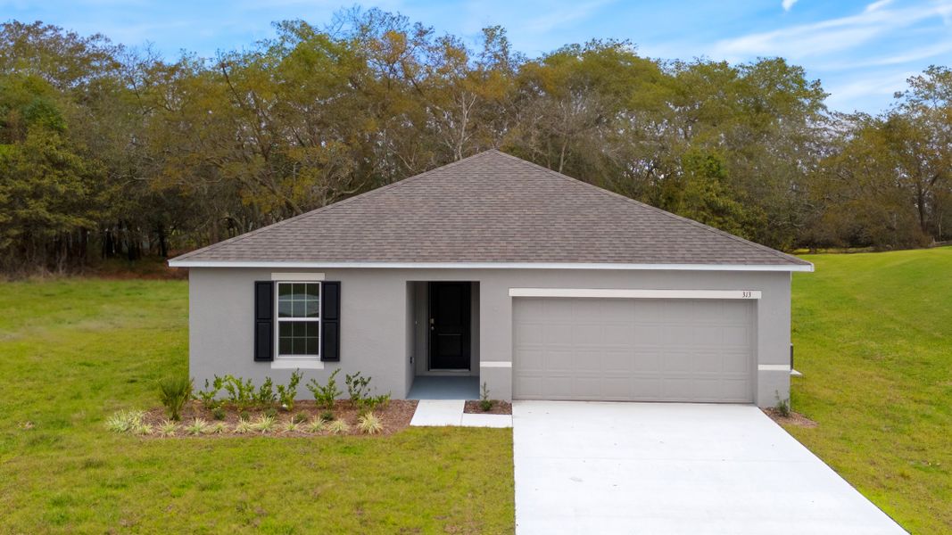 Representative exterior photo of a completed home built from the Magnolia by Maronda Homes in Coastal Communities, Edgewater, FL (Image 1). Representative exterior photo of a completed home built from the Magnolia by Maronda Homes in Coastal Communities, Edgewater, FL (Image 1).