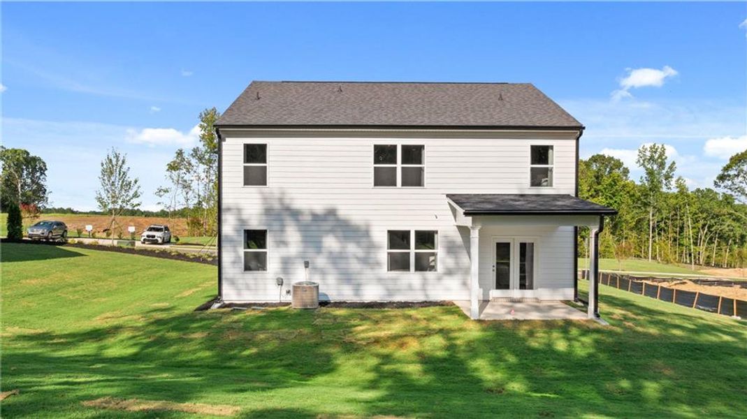 Front exterior of a new home in Kingston Ranch at Lake Oconee, Buckhead, GA, highlighting curb appeal (Image 25).