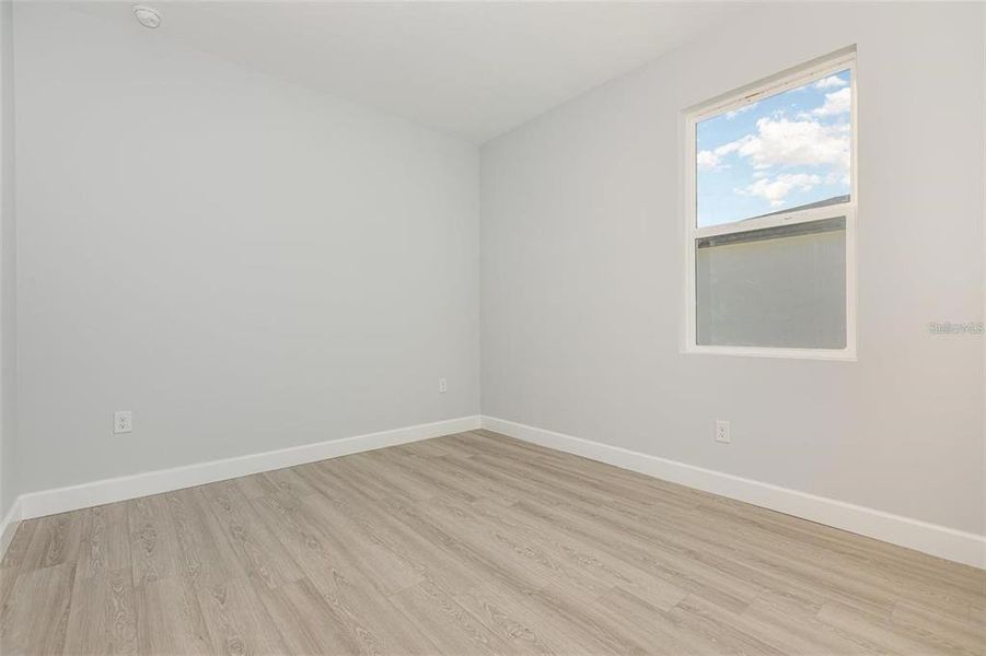Spacious, unfurnished interior of a new home in , Port Charlotte (Image 12).