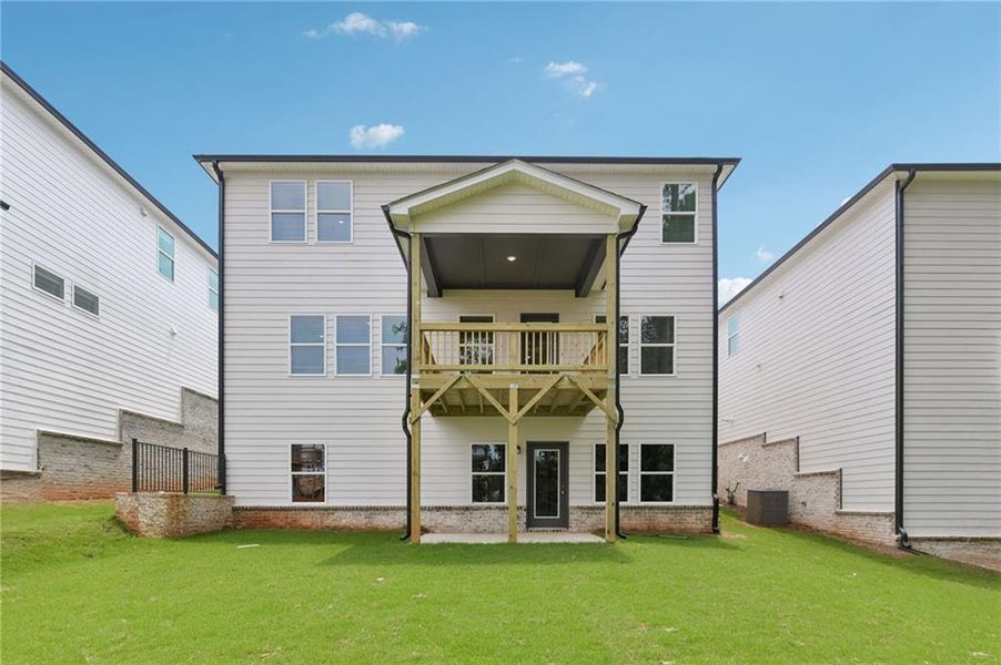 Exterior details and patio area of a home in Martin Springs - Estate Series, Lawrenceville (Image 27).