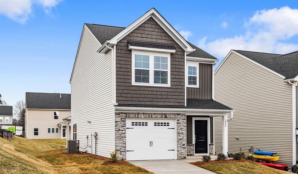 Front exterior of a new home in Hanes Lake, Winston-Salem, NC, highlighting curb appeal (Image 19).