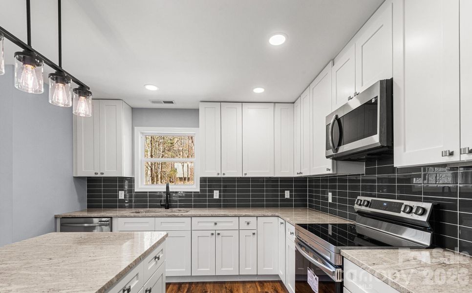 Furnished interior view inside a new home in , Maggie Valley (Image 14).