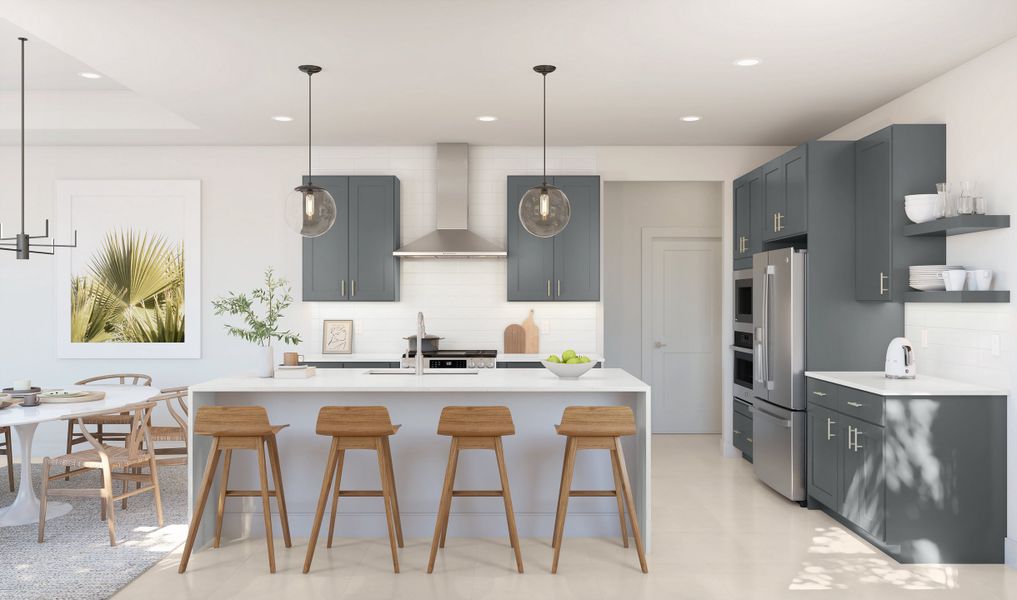 Kitchen with waterfall island and pendant lighting Kitchen with waterfall island and pendant lighting