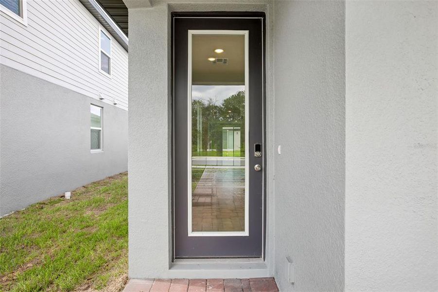 Exterior details and patio area of a home in Villamar - Classic Series, Winter Haven (Image 3).