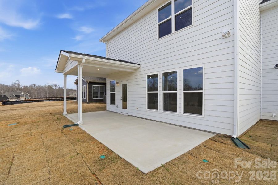 Exterior details and patio area of a home in Forest Creek, Waxhaw (Image 24).
