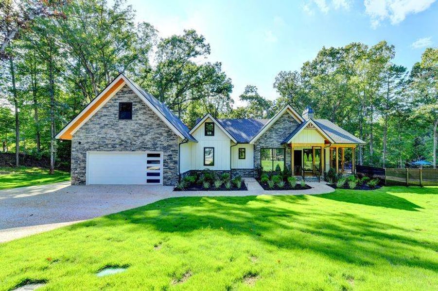 Front exterior of a new home in , Gainesville, GA, highlighting curb appeal (Image 25).