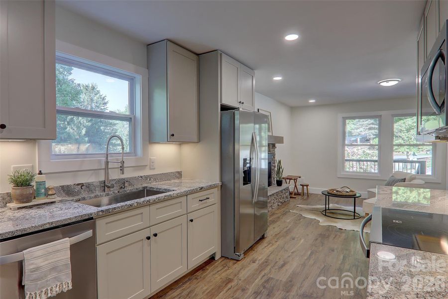 Furnished interior view inside a new home in , Waynesville (Image 19).