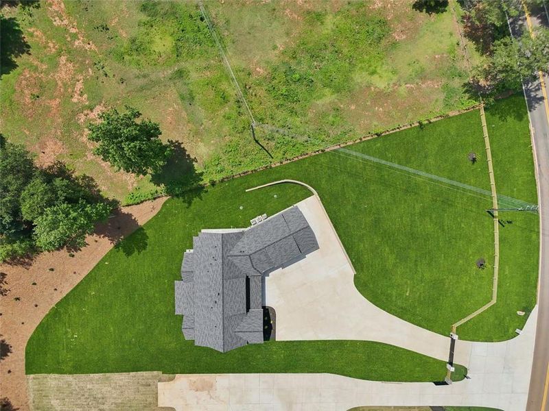 Front exterior of a new home in , Braselton, GA, highlighting curb appeal (Image 42). Front exterior of a new home in , Braselton, GA, highlighting curb appeal (Image 42).