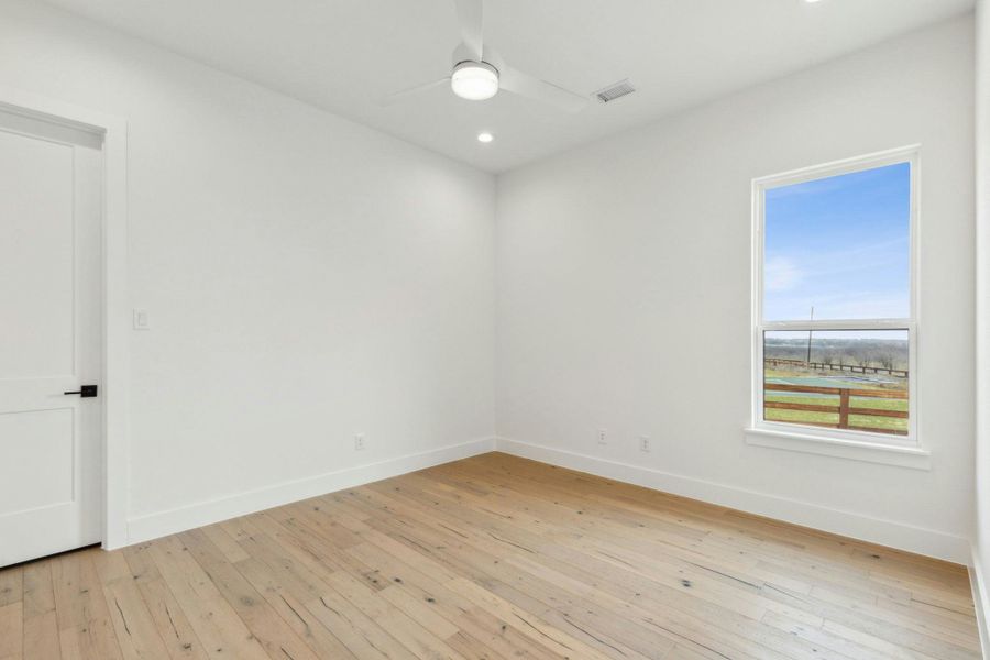 Spacious, unfurnished interior of a new home in The Vines, Haslet (Image 24).